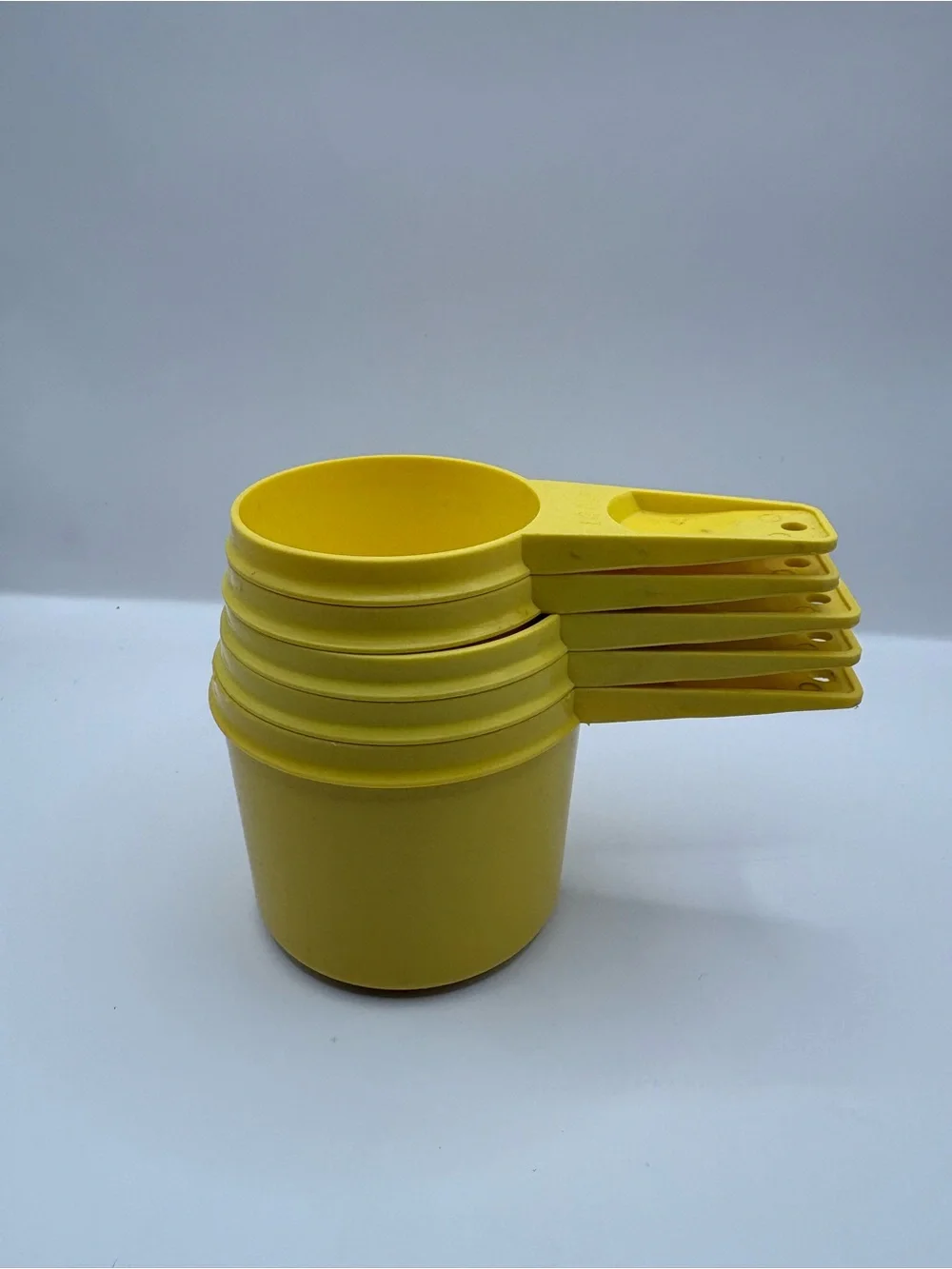 Tupperware Yellow Nesting Measuring Cups - Set of 5